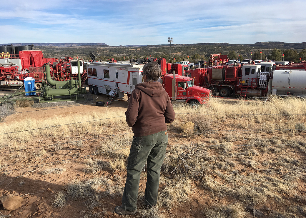 Don Schreiber’s wife Jane overlooks a fracking operation on their land. Photo by Don Schreiber.