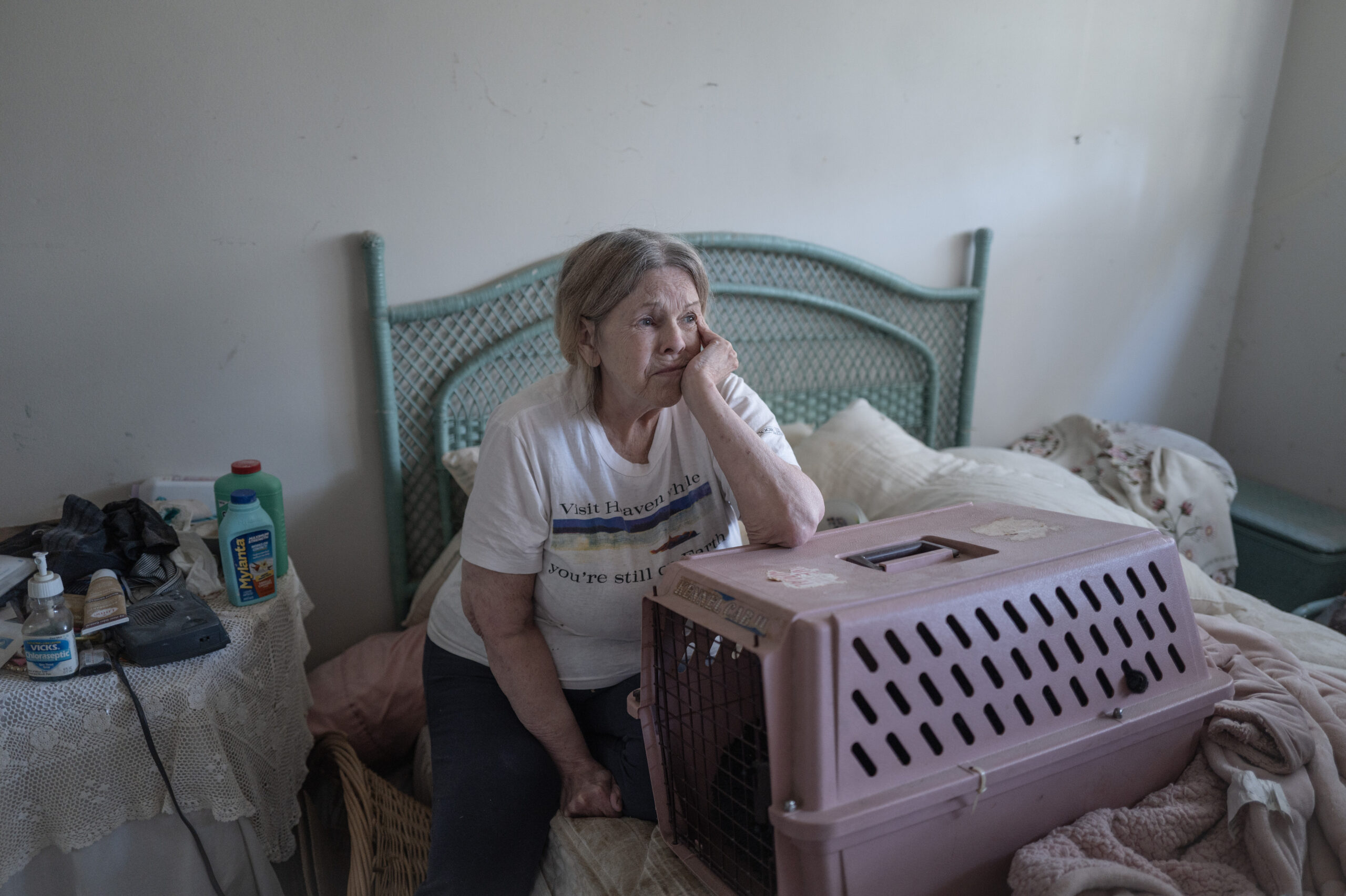 Joanne Erickson, 70, quietly soothes her cat, Muriel, telling her “everything will be OK” as she watches movers pack her belongings to take them to a storage unit. Erickson lost her legal bid to stay in her Playa del Rey apartment of 23 years, and was evicted in early February.
All photos by Barbara Davidson.